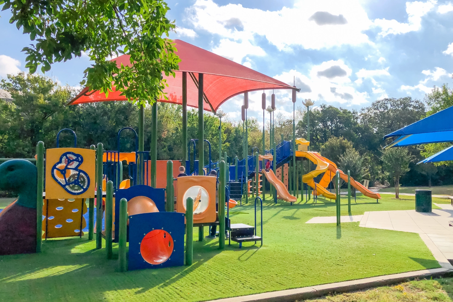 Artificial grass playground installation